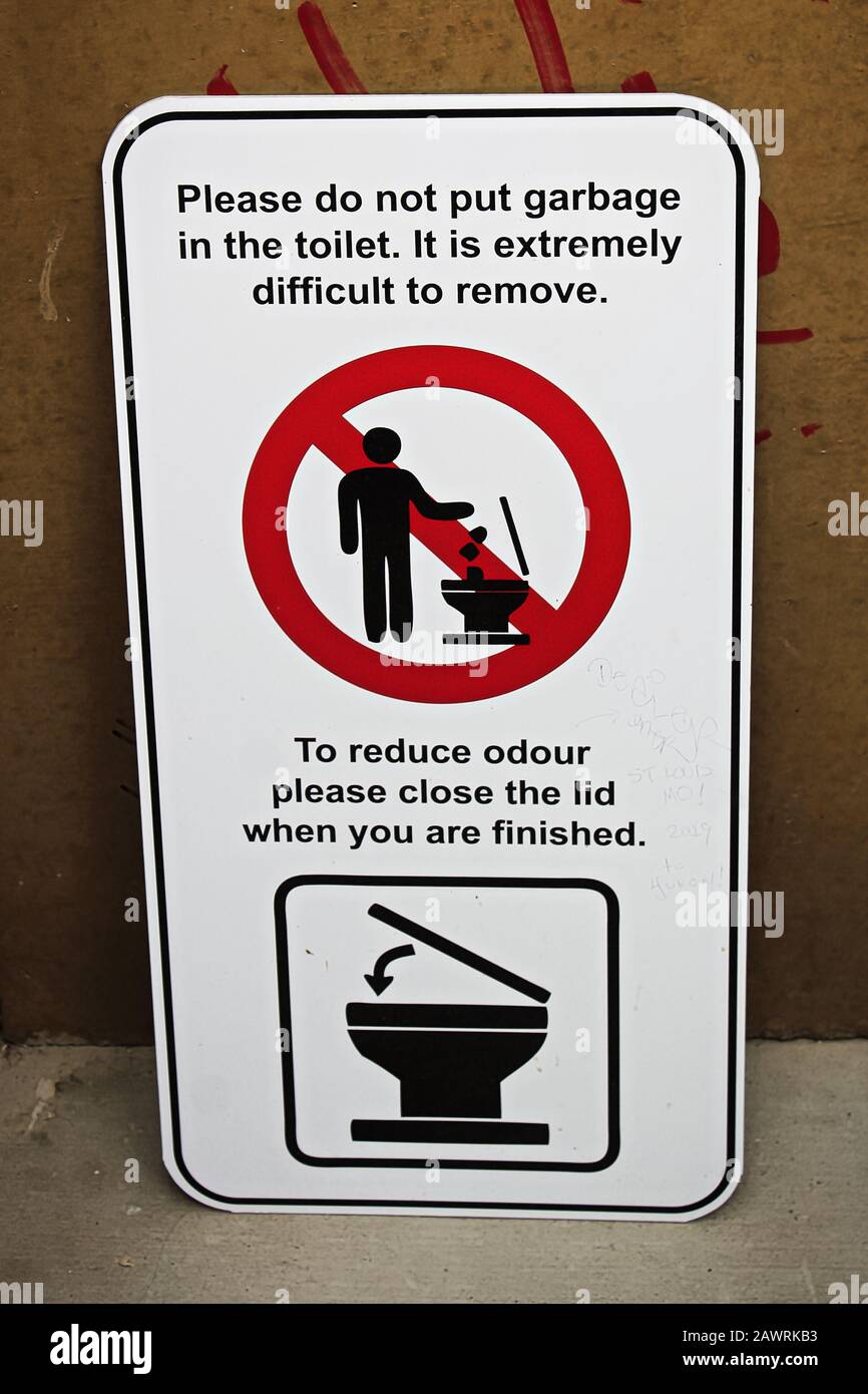 A please do not put garbage in toliet sign Stock Photo