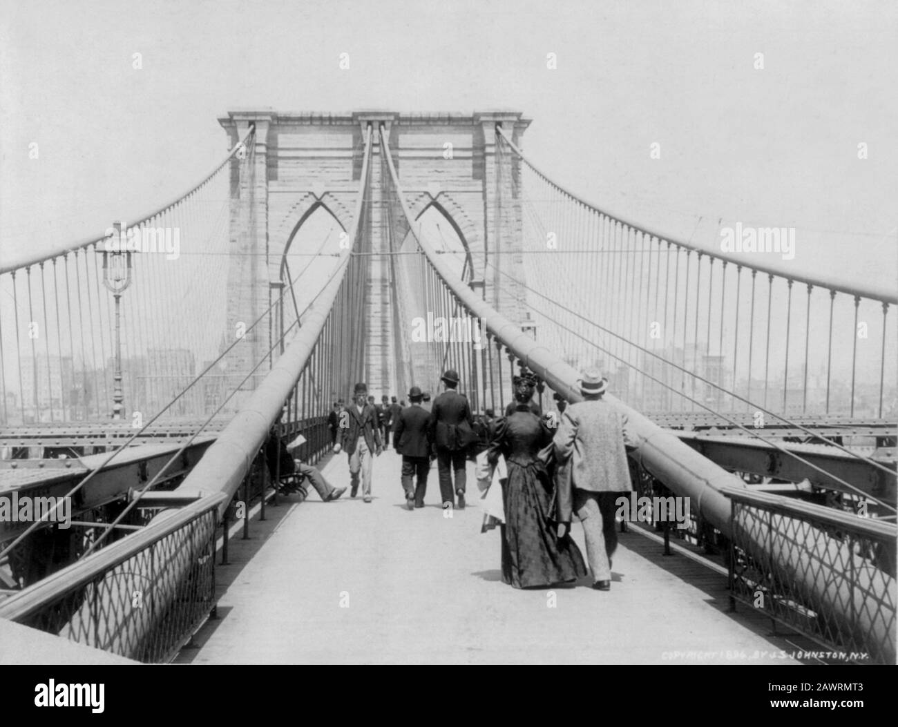 1894, NEW YORK , USA : On the promenade . Brooklyn Bridge, New York City . The great East River suspension bridge, opened the day 24 may 1883 -- Conn Stock Photo - Alamy