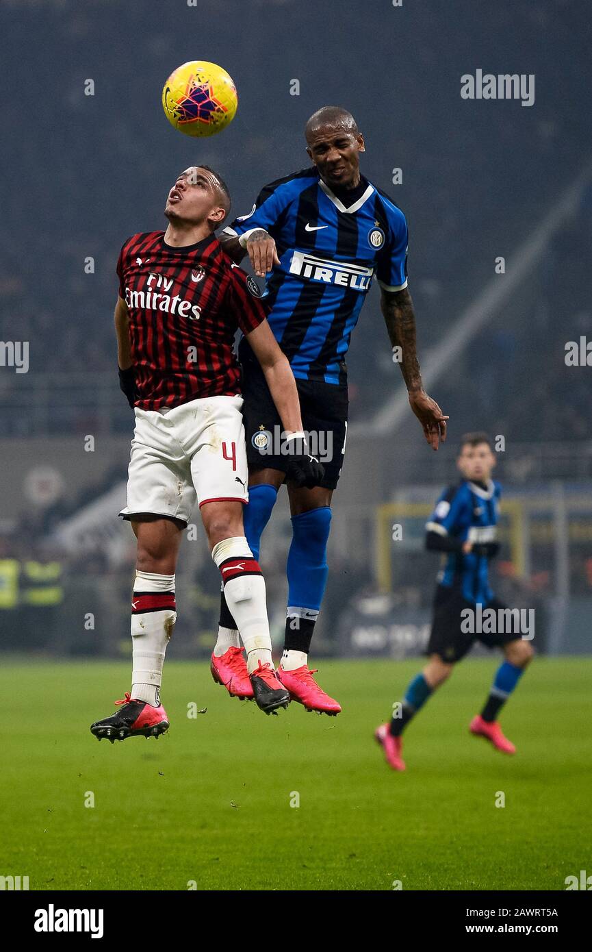 Milan, Italy - 09 February, 2020: Ismael Bennacer (L) of AC Milan competes for a header with Ashley Young of FC Internazionale during the Serie A football match between FC Internazionale and AC Milan. Credit: Nicolò Campo/Alamy Live News Stock Photo