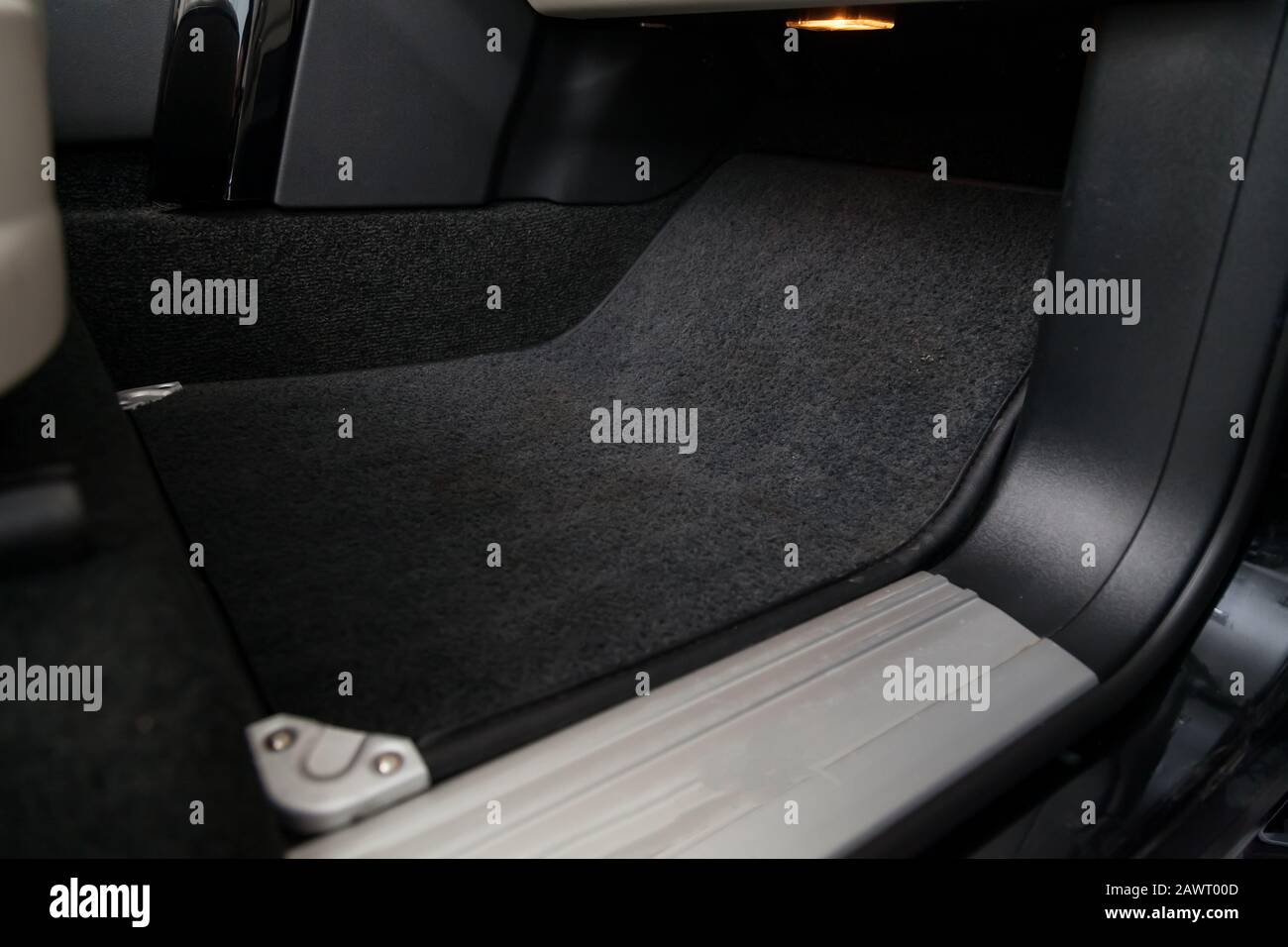 Clean Car Floor Mats Of Black Carpet Under Front Passenger Seat In