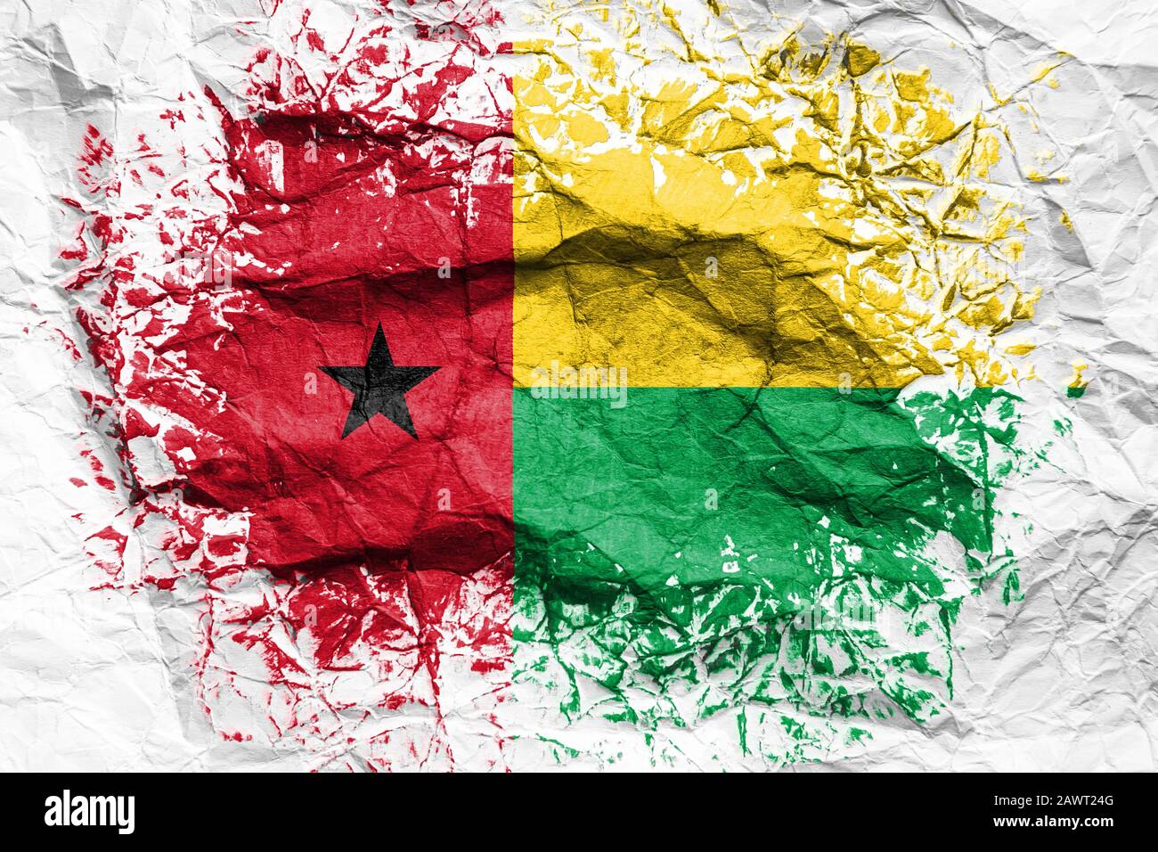 The national flag of the Guinea Bissau is painted on crumpled paper ...