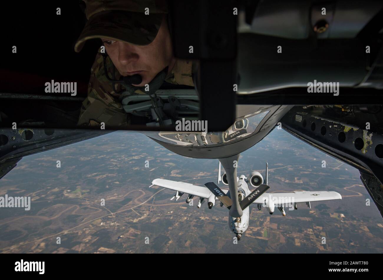 A U.S. Air Force KC-135 Stratotanker boom operator, assigned to the Mississippi Air National Guard 186th Air Refueling Wing, refuels an A-10 Thunderbolt II as part of Southern Strike 2020 over the Gulfport Combat Readiness Training Center, Miss., on Feb. 7, 2020. Southern Strike is a large-scale, joint and international combat exercise, featuring counter insurgency, close air support, non-combatant evacuation, and maritime special operations. (U.S. Air Force photo by Staff Sgt. Trevor T. McBride) Stock Photo