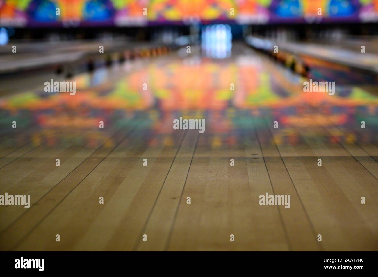 View down bowling alley with gutter guards in place Stock Photo - Alamy