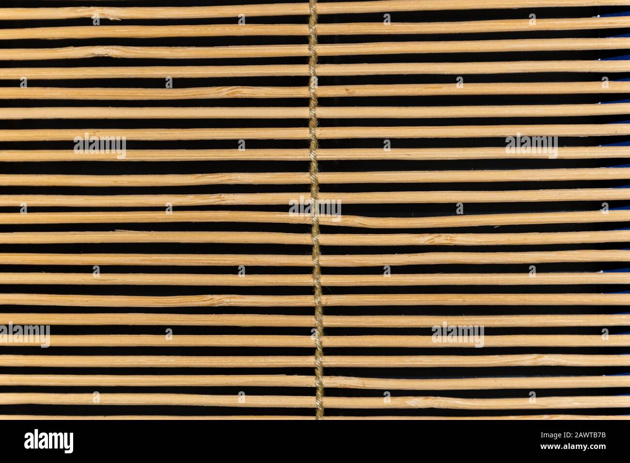 A close-up of wooden oriental jalousie blinds over a window (texture/background/pattern) Stock Photo