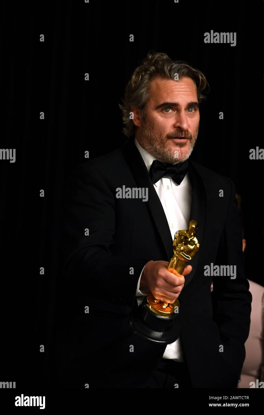 Joaquin Phoenix with his Best Actor Oscar for Joker in the press room