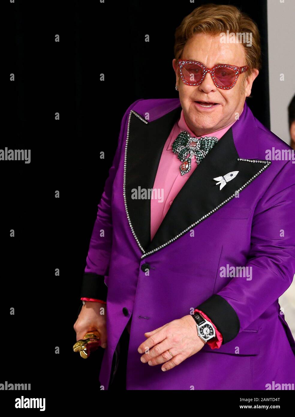 HOLLYWOOD, CA - FEBRUARY 9: Elton John poses in the press room during
