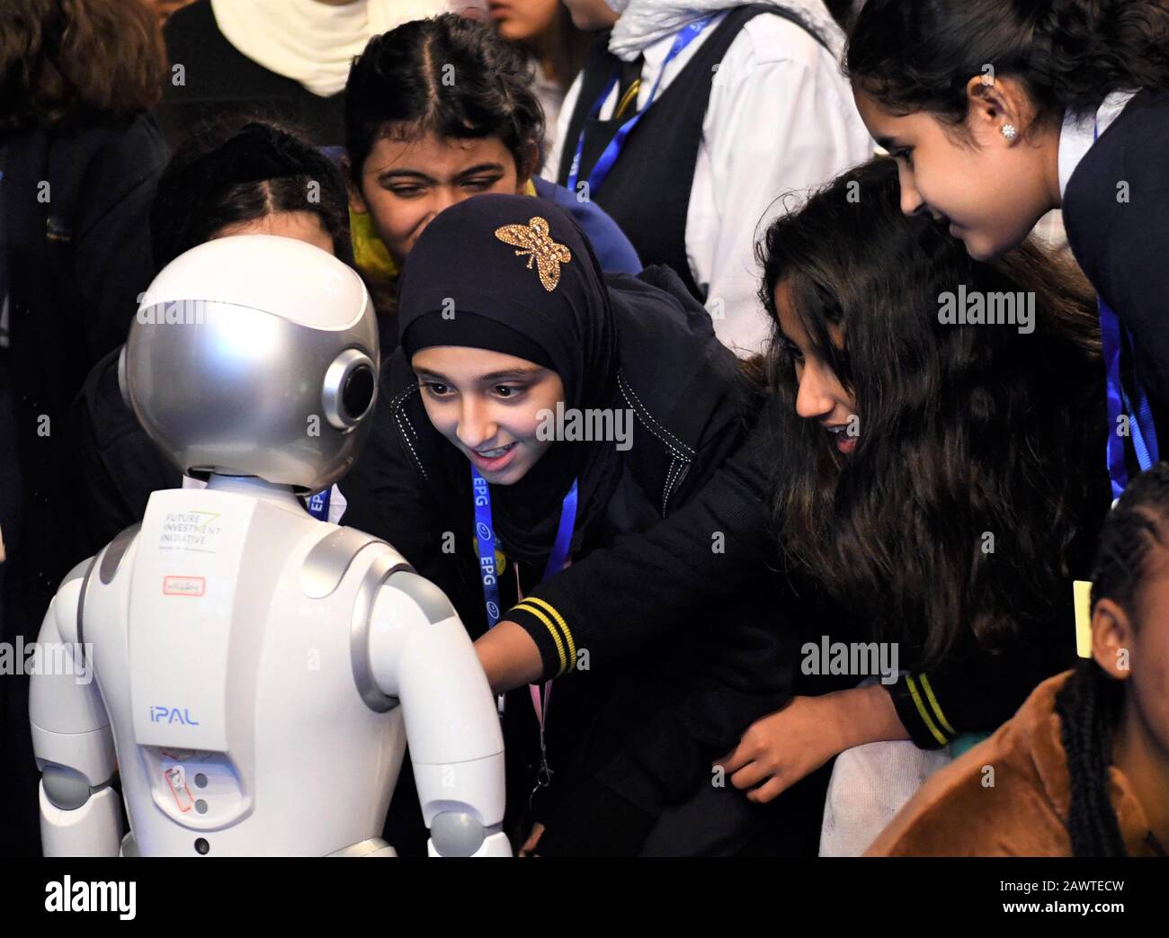 Beijing, Kuwait. 9th Feb, 2020. Children interact with a robot at the Robotics and Artificial Intelligence (AI) Festival in Hawalli Governorate, Kuwait, on Feb. 9, 2020. Credit: Ghazy Qaffaf/Xinhua/Alamy Live News Stock Photo
