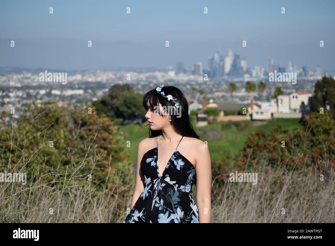 Lovely young woman stands hi-res stock photography and images - Alamy