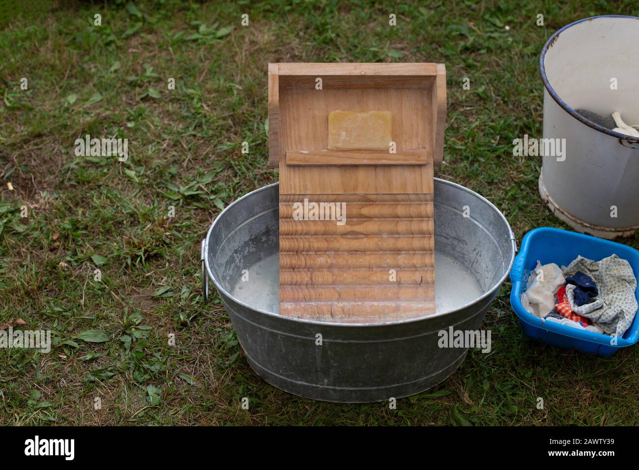 Old zinc wash tub with wooden washboard for getting the clothes clean Stock  Photo - Alamy