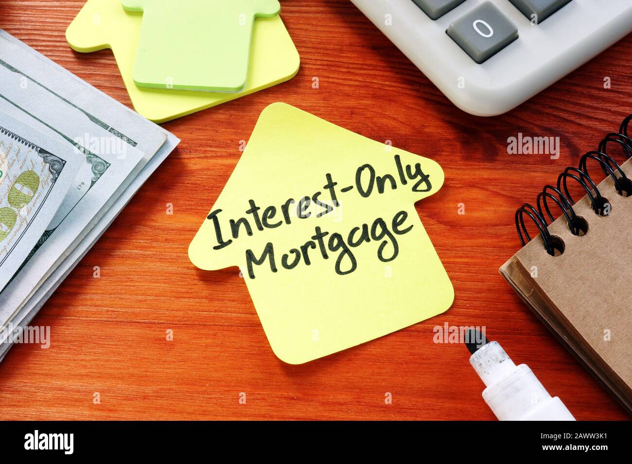 Interest Only Mortgage phrase on the paper home. Stock Photo