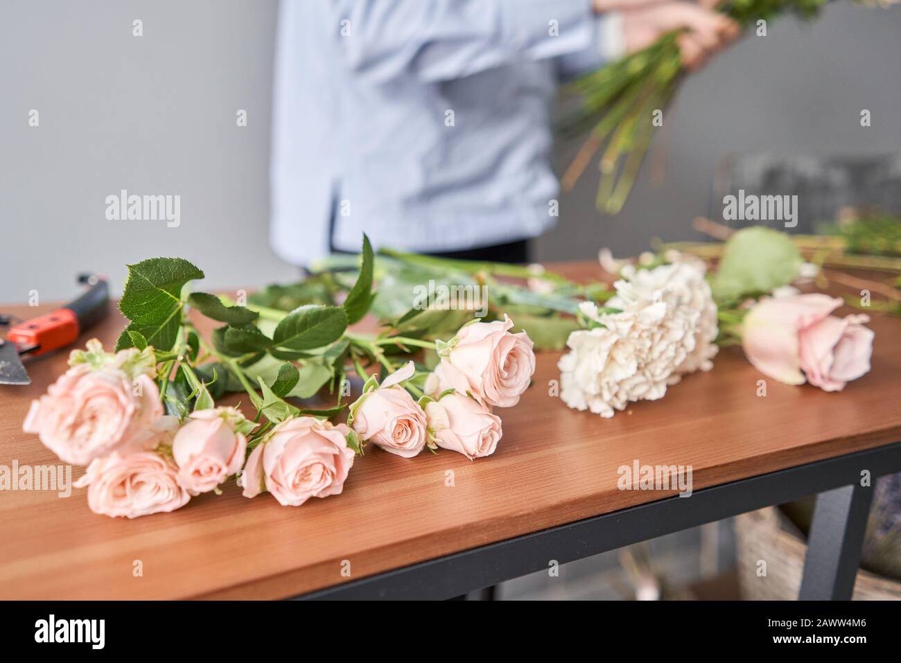 Beautiful bouquet of mixed flowers on a vintage sofa. the work of the
