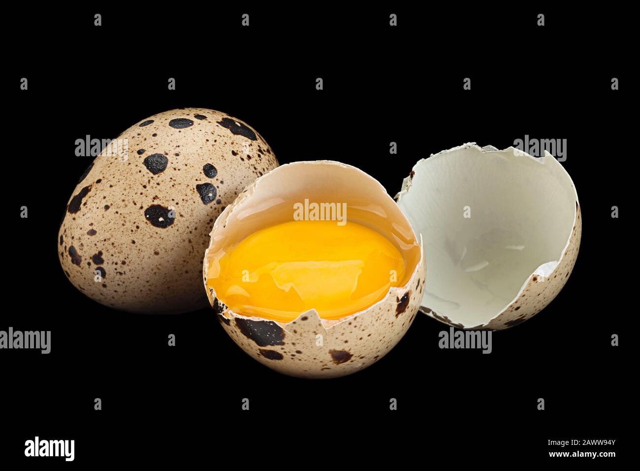 Quail eggs closeup isolated on black background Stock Photo