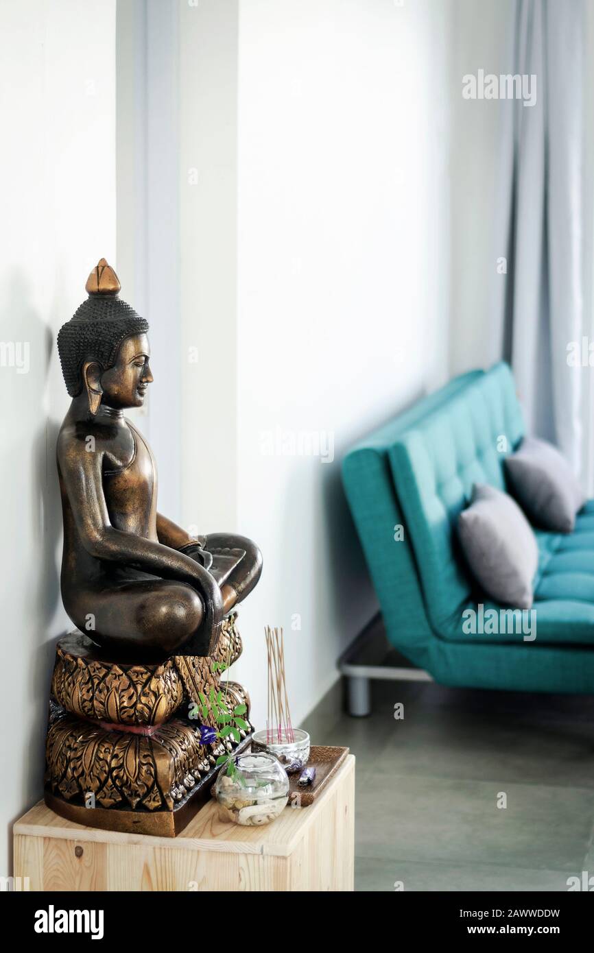 bronze buddha statue interior design detail in modern asian home living ...
