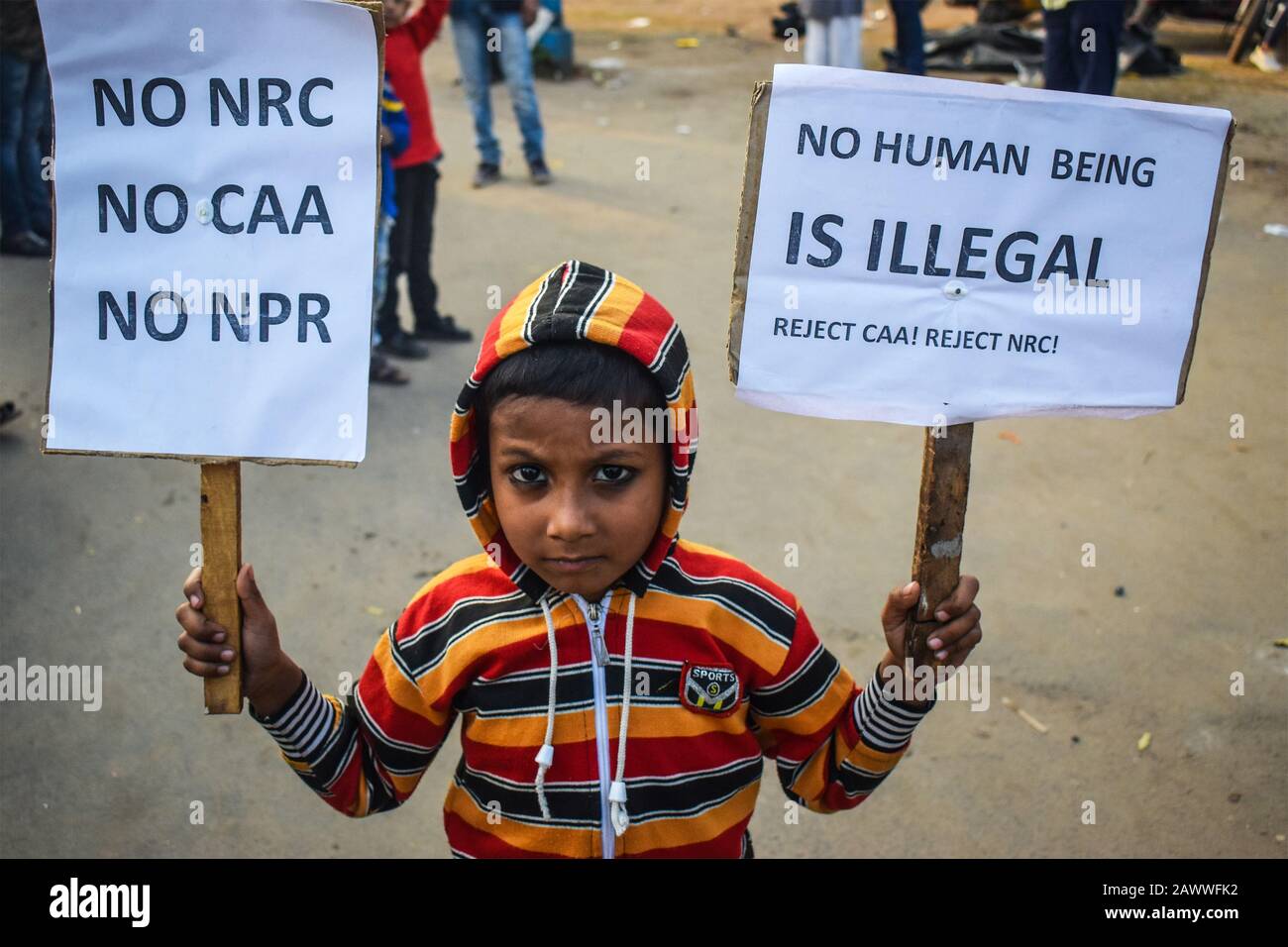 A little boy is showing the No NRC placard on a protest Program for NRC and CAA in Kolkata, India. Stock Photo