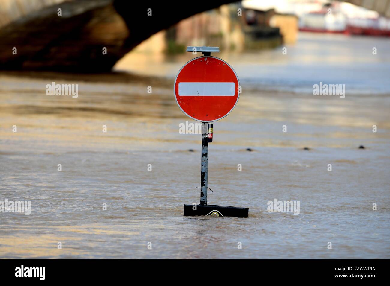 Floodwater engulfs a signpost in York in the aftermath of Storm Ciara which lashed the country Sunday. Stock Photo