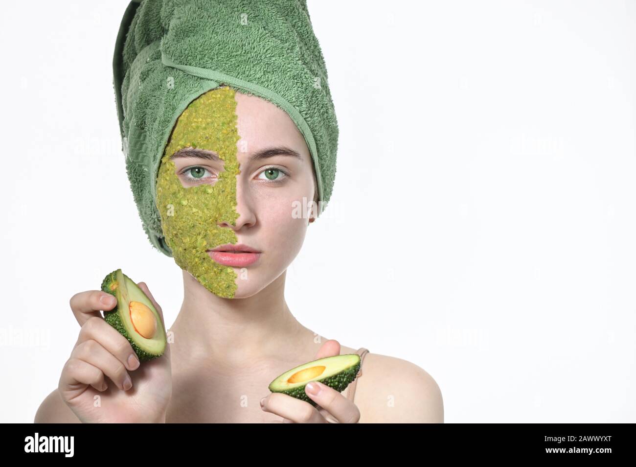 Natural Cosmetics On Woman In Facial Mask With Avocado Stock Photo