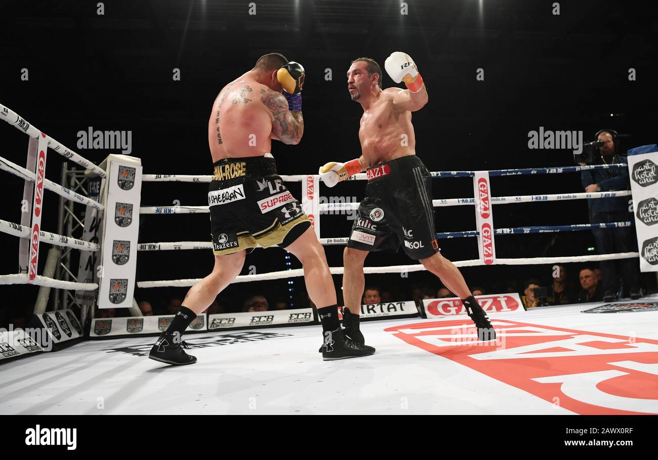 08 February 2020, Baden-Wuerttemberg, Göppingen: Boxing, professionals: IBO World Championship, Cruiserweight, Arslan (Germany) - Lerena (South Africa) in the EWS Arena. Firat Arslan (r) from Germany fights against Kevin Lerena (l) from South Africa. Photo: Marijan Murat/dpa Stock Photo