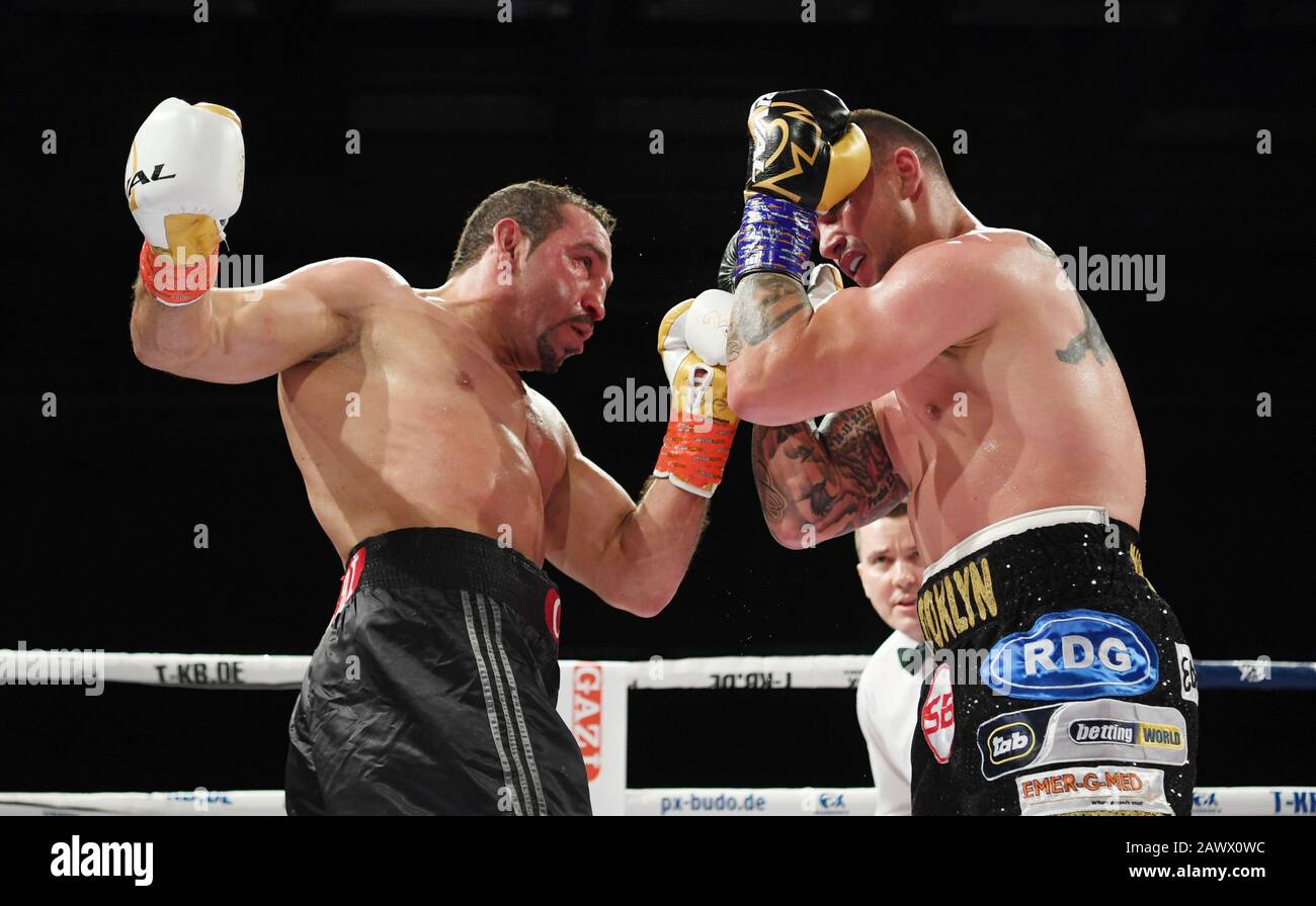 08 February 2020, Baden-Wuerttemberg, Göppingen: Boxing, professionals: IBO World Championship, Cruiserweight, Arslan (Germany) - Lerena (South Africa) in the EWS Arena. Firat Arslan (l) from Germany fights against Kevin Lerena (r) from South Africa. Photo: Marijan Murat/dpa Stock Photo