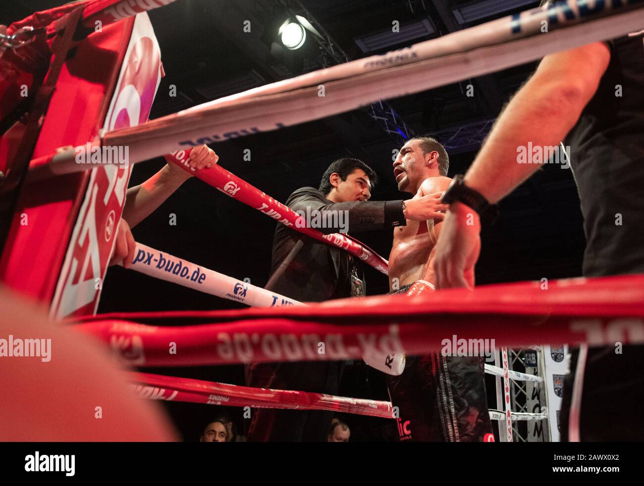 09 February 2020, Baden-Wuerttemberg, Göppingen: Boxing, professionals: IBO World Championship, Cruiserweight, Arslan (Germany) - Lerena (South Africa) in the EWS Arena. Firat Arslan (l) from Germany after the fight. Photo: Marijan Murat/dpa Stock Photo