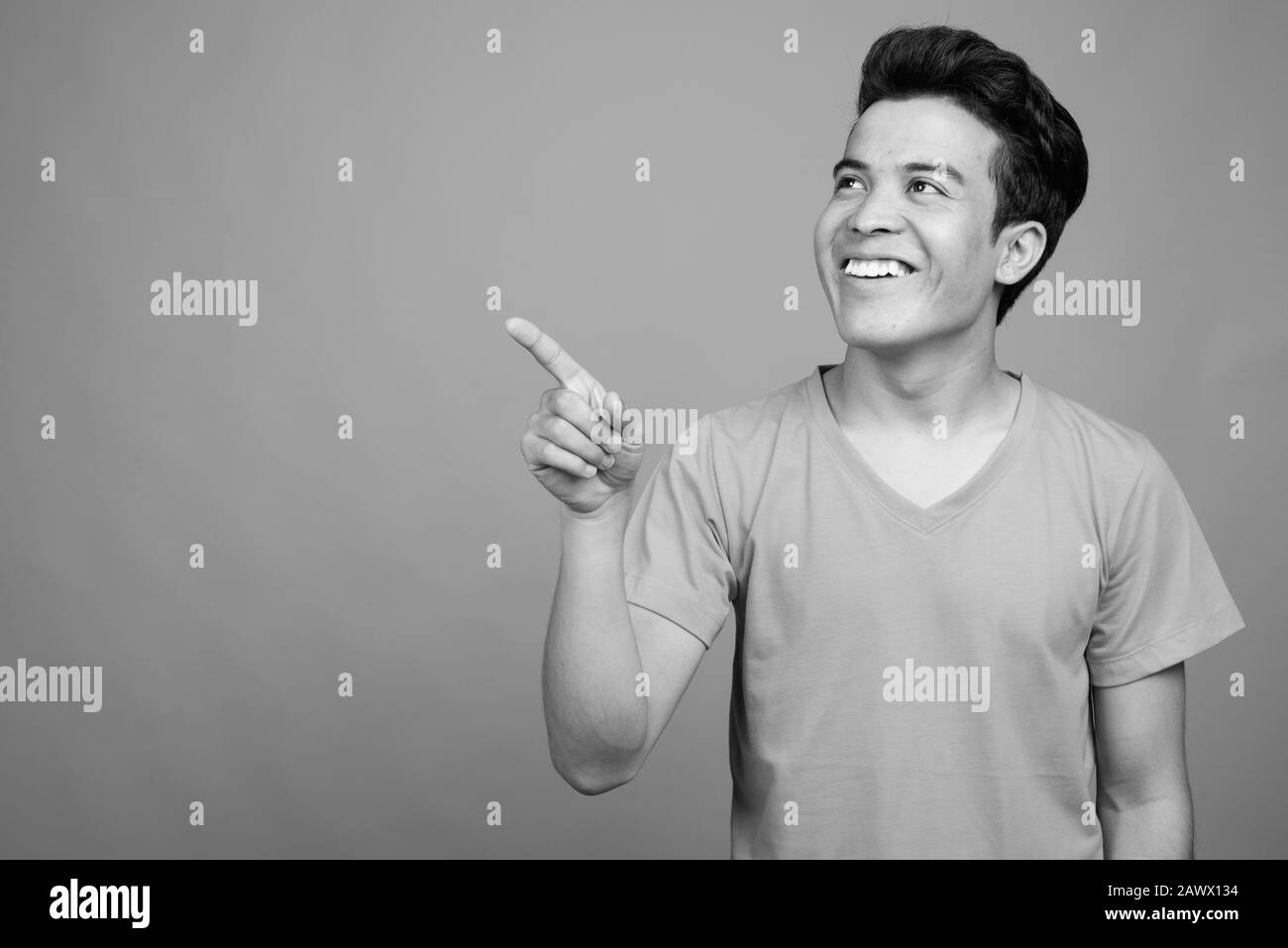 Finger pointing asian man Black and White Stock Photos & Images - Alamy