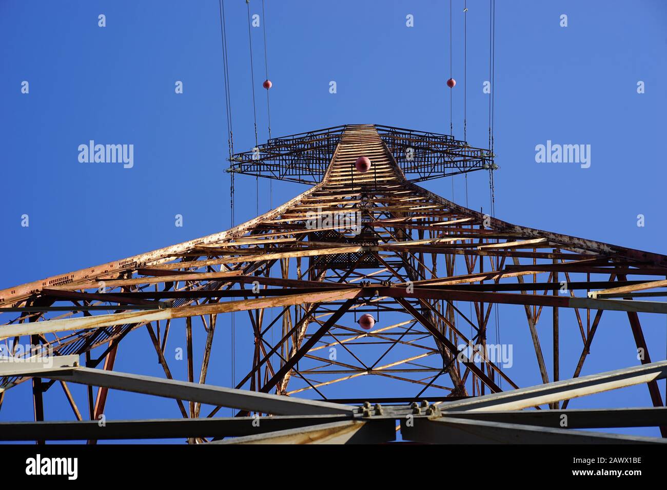 Electric pole with blue sky as background Stock Photo - Alamy
