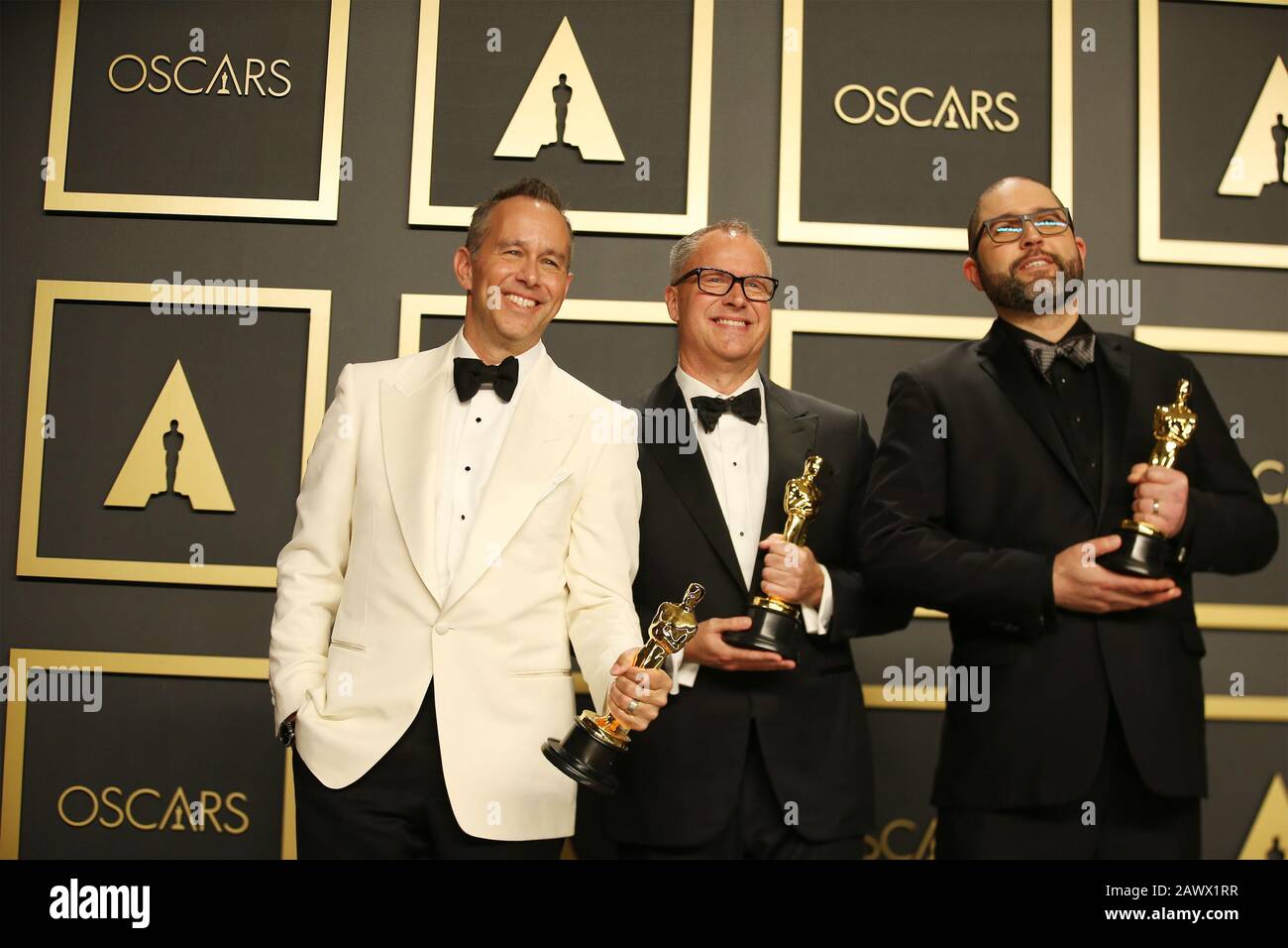 Los Angeles, USA. 9th Feb, 2020. (From L to R)Jonas Rivera, Mark Nielsen and Josh Cooley pose for photos after winning the Best Animated Feature Film award for 'Toy Story 4' at the 92nd Academy Awards ceremony at the Dolby Theatre in Los Angeles, the United States, Feb. 9, 2020. Credit: Li Ying/Xinhua/Alamy Live News Stock Photo