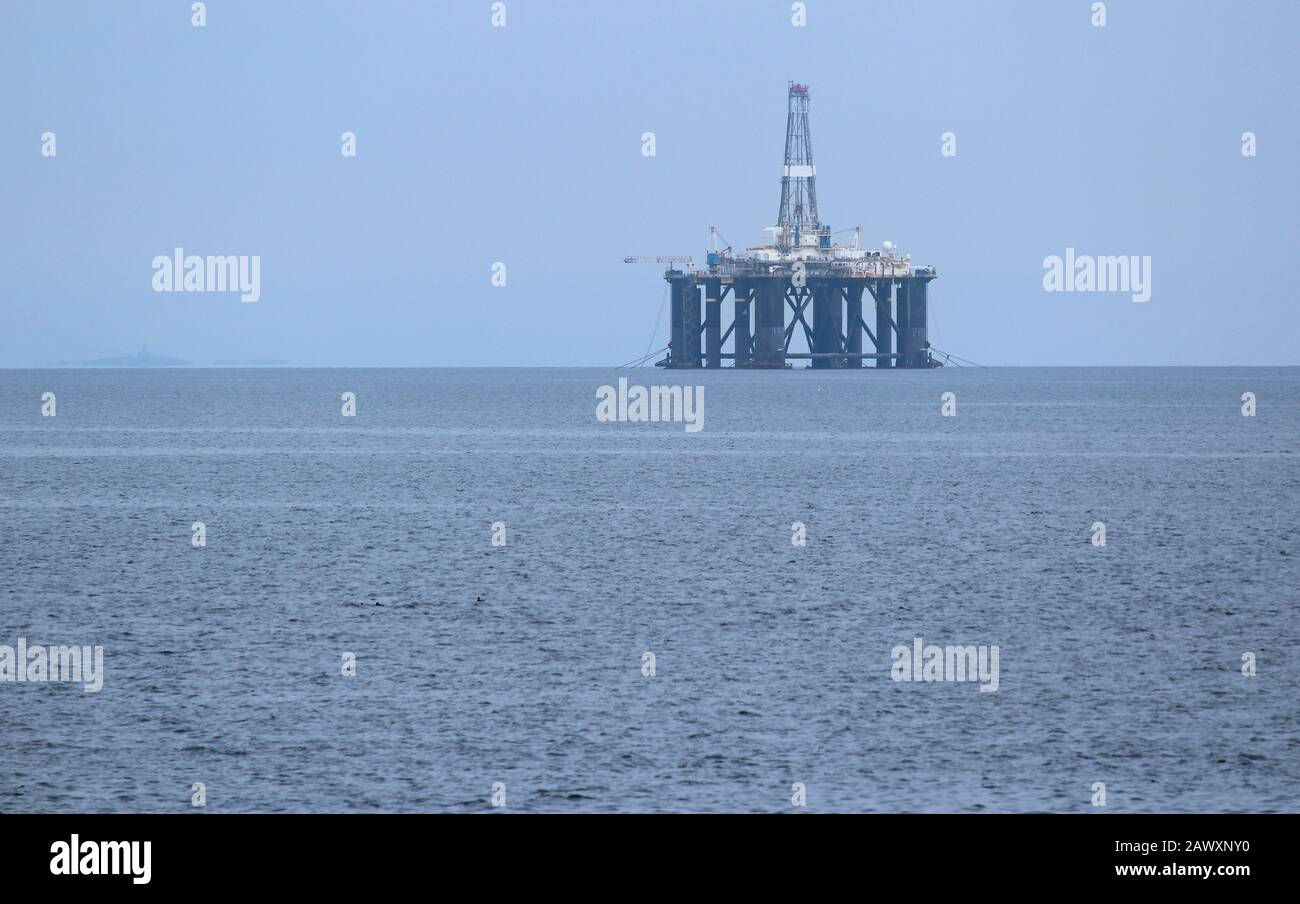 View of an Oil Rig Platform in the Firth of Forth, on the East coast of Scotland. Viewed from West Wemyss, in Fife. With copy space. Stock Photo