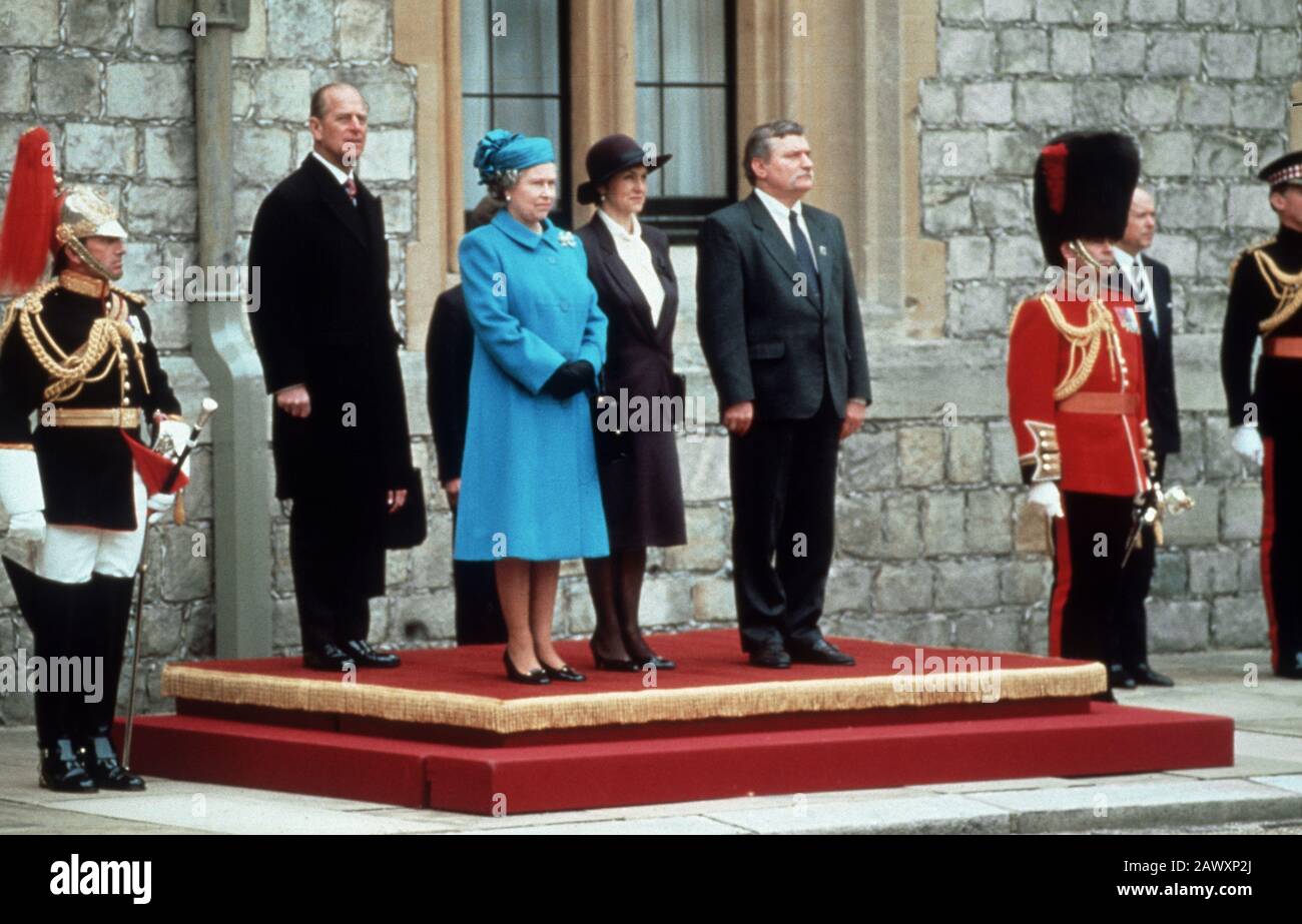 Lech Wałęsa and Mirosława Danuta Gołoś (right) are greeted by HRH Duke of Edinburgh and HM Queen Elizabeth II upon their arrival at Windsor Castle dur Stock Photo