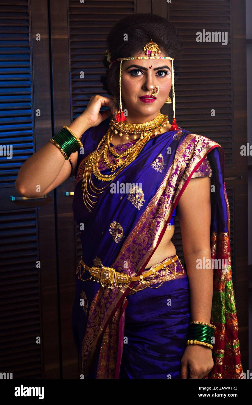 Beautiful Indian Marathi bride in traditional nauvari saree and ...