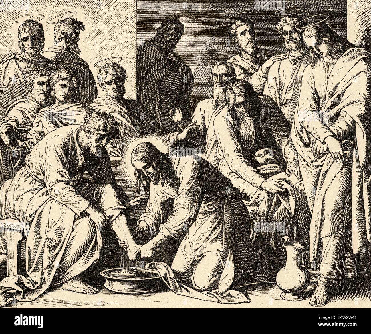 The foot washing. Our Lord Jesus the son of God washes the feet of his disciples. John book, New Testament Sacred biblical history. Old engraving Stock Photo