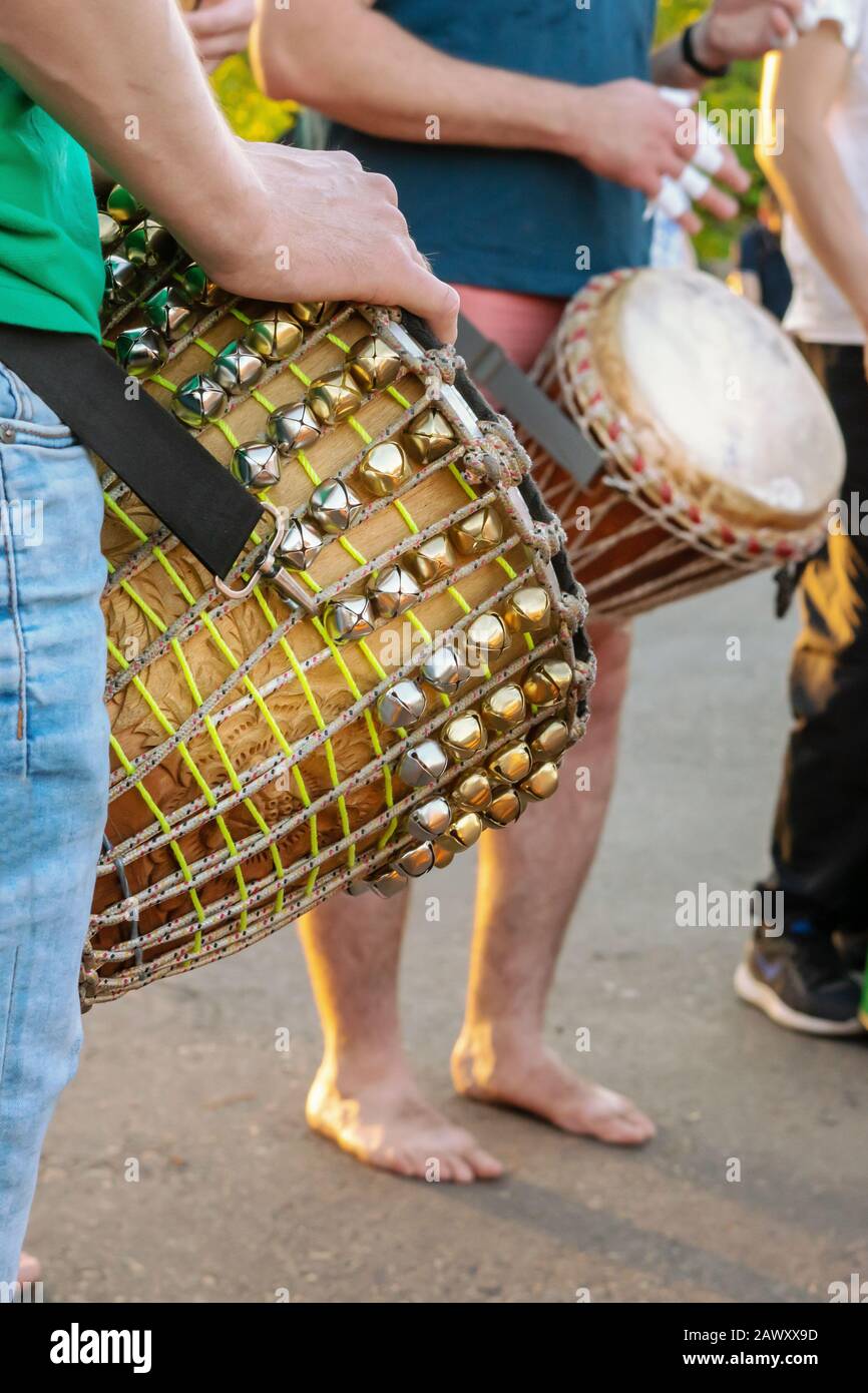 African drums there there, men playing Djemba, hands close-up. Stock Photo
