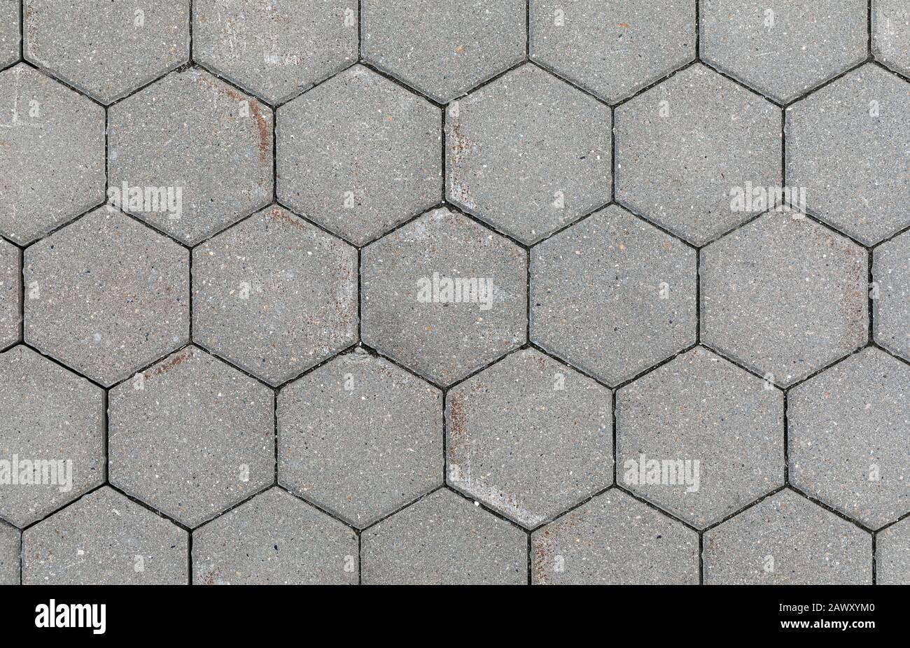 The texture of concrete hexagonal paving tiles close-up Stock Photo