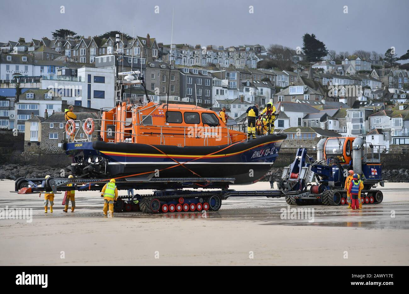 An RNLI boat is brought ashore at St Ives, The Met Office have said that 'a spell of very strong winds,' with gusts of 60-70mph, is expected across southern England on Monday, bringing likely delays to road, rail, air and ferry transport. Stock Photo