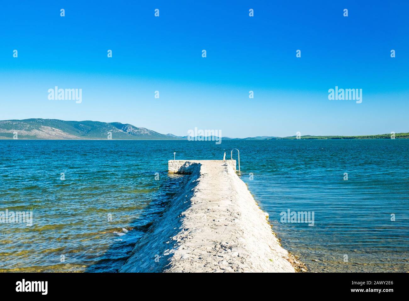 Pier in nature park Vrana lake (Vransko jezero), Dalmatia, Croatia Stock Photo