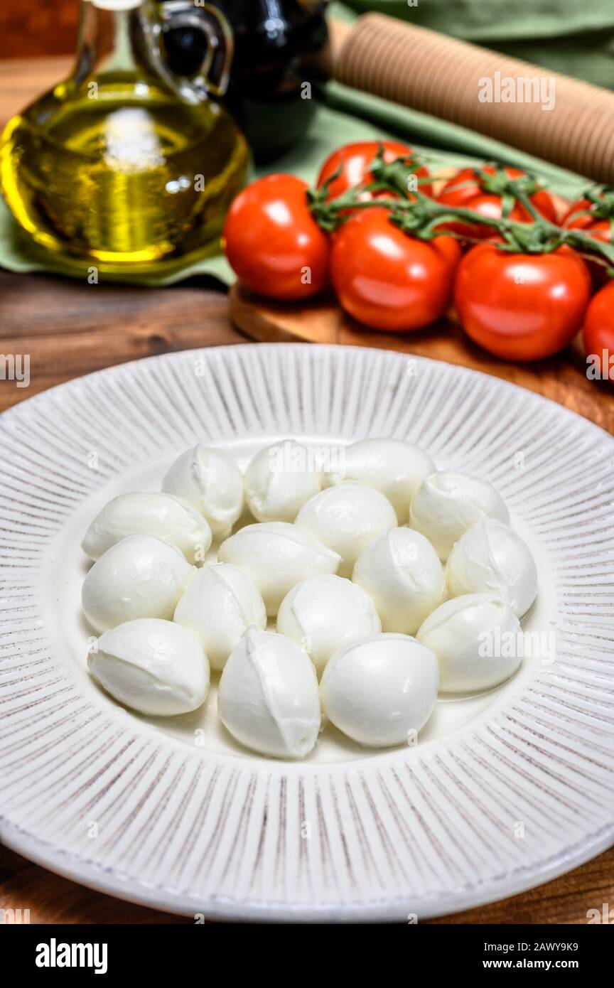 Cheese collection, white mini mozzarella cheese balls for salad or for  appetizer snacks close up Stock Photo - Alamy