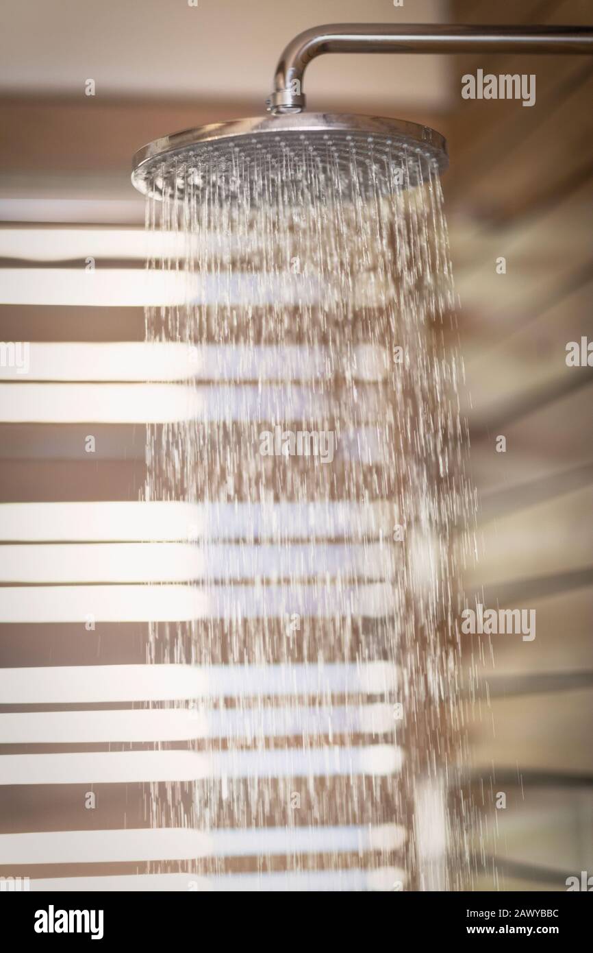 Water falling from rain shower head Stock Photo Alamy