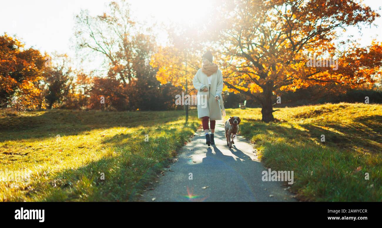 Woman walking full length autumn hi-res stock photography and images ...