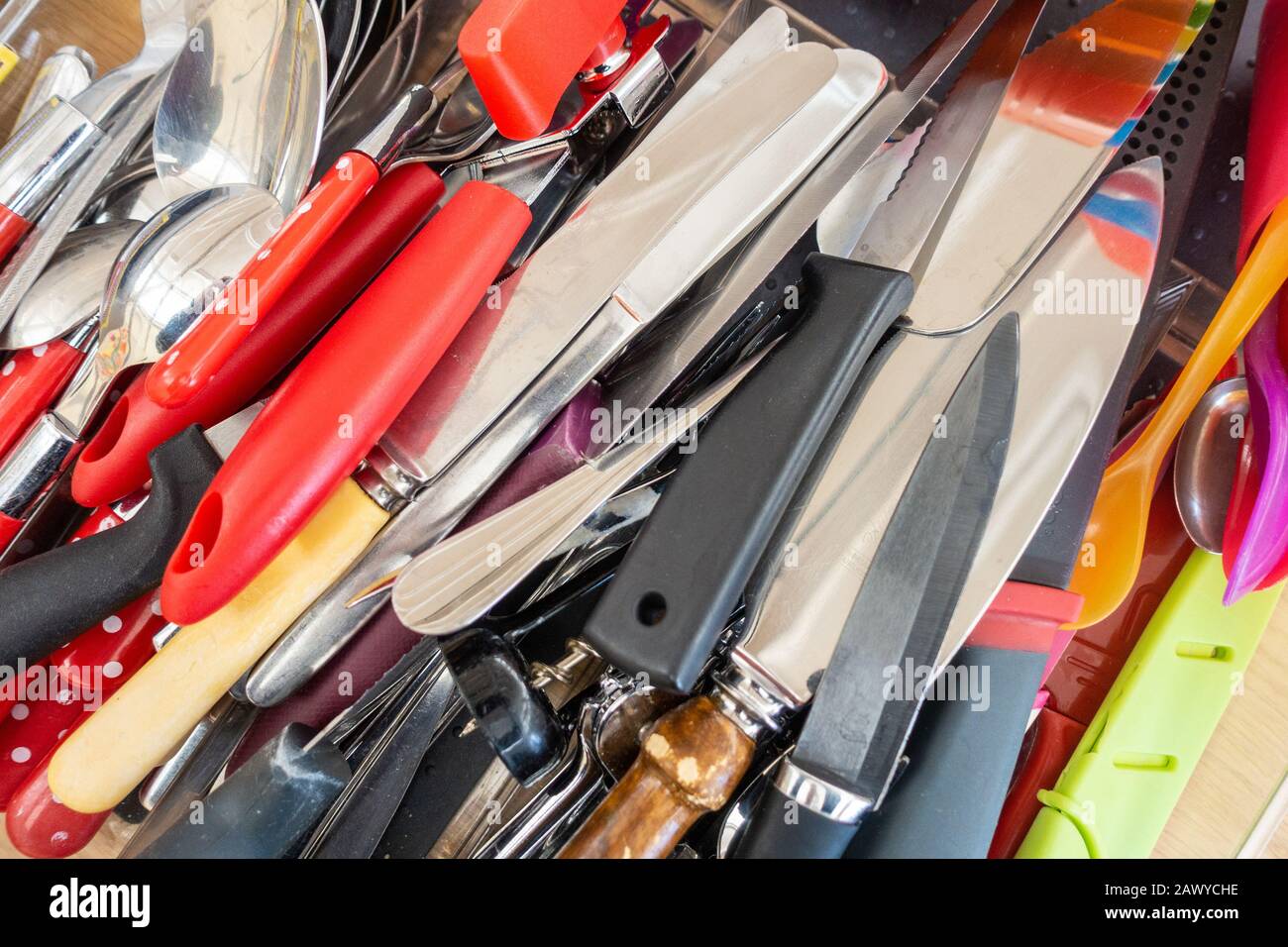 Close up view of kitchen knives and other cutlery Stock Photo