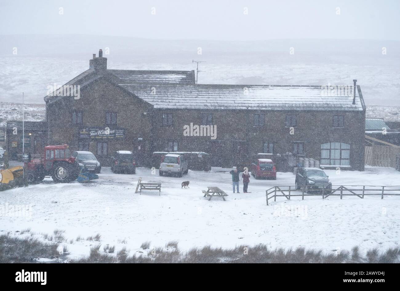 Snowy conditions at the Tan Hill Inn in Reeth in the Yorkshire Dales, weather warnings for wind, snow and ice have been issued across large parts of the country as the UK struggles to recover from the battering from Storm Ciara. Stock Photo
