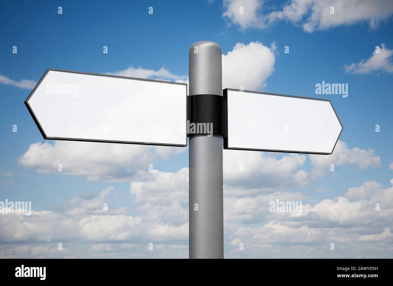 Blank sign two way metal signpost against a blue sky Stock Photo
