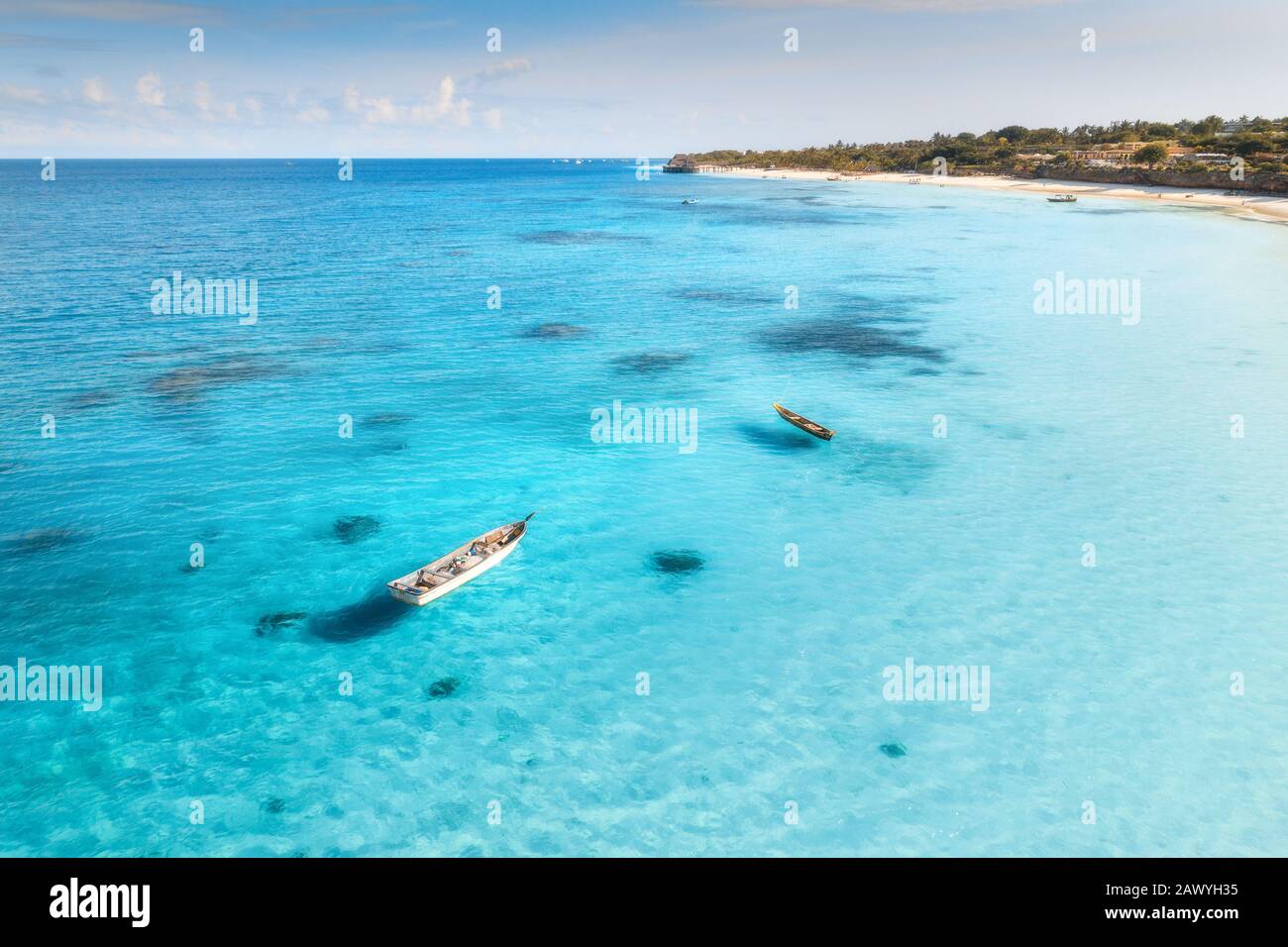 Aerial view of the fishing boat in clear blue water Stock Photo - Alamy
