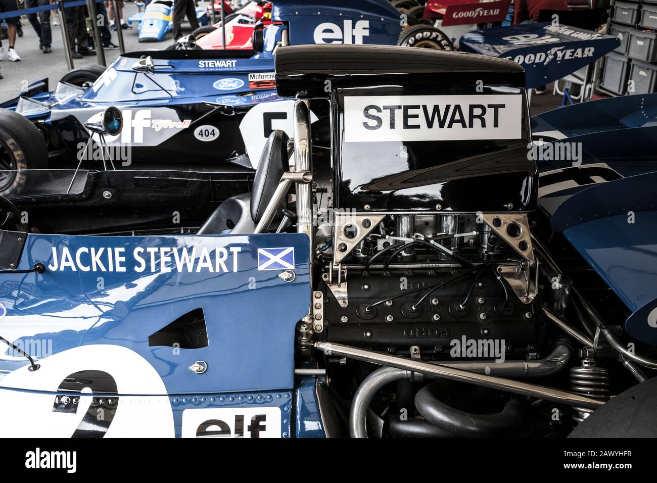 Three of Jackie Stewart's Tyrrell F1 racing cars in the pits at the 2018 Goodwood Festival of Speed. Stock Photo