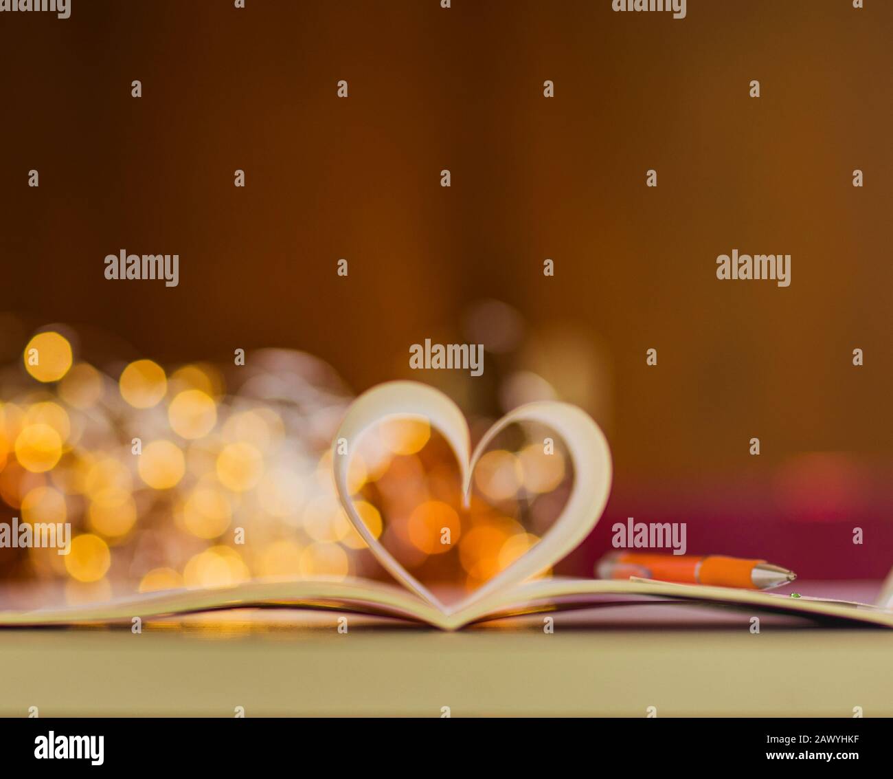 Book pages forming heart shape Stock Photo