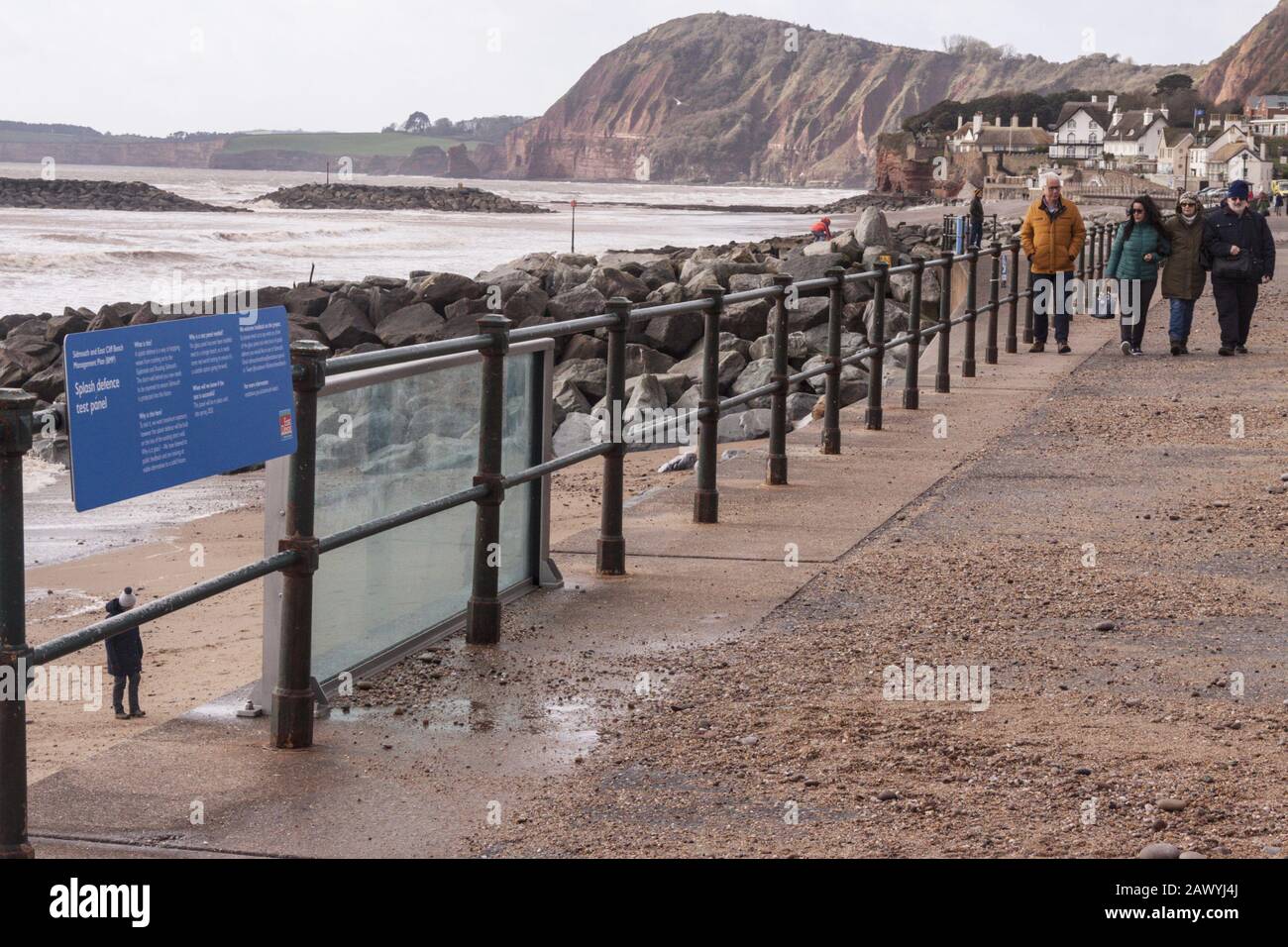 Sidmouth, Devon. 10th Feb 2020. UK Weather: Glass sea defence panels installed on test on the sea wall at Sidmouth, Devon, withstood the full battering of storm Ciara, which pounded the seafront, and the panels, with shale and rock. Credit: Photo Central/Alamy Live News Stock Photo