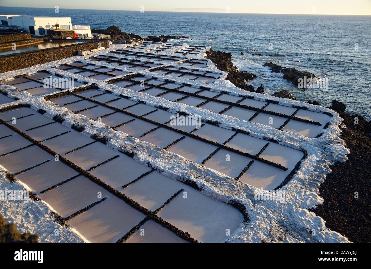 Salt pans. Evaporation of seawater to leave pure salt. Salinas de Fuencaliente, La Palma Island, Canaries. Stock Photo