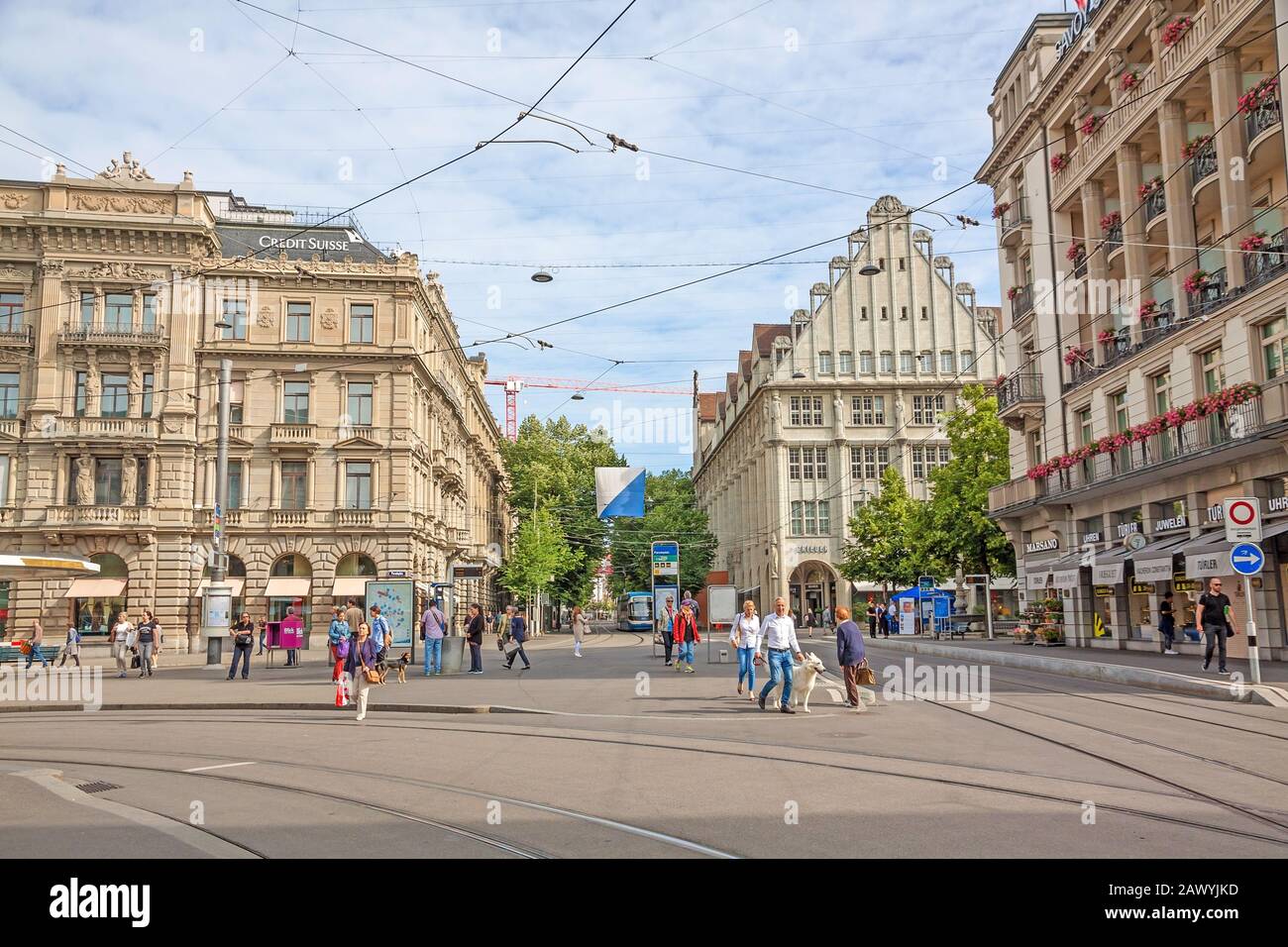 Zurich, Switzerland - June 10, 2017: Square Paradeplatz , inner city of Zurich, view towards shopping promenade called Bahnhofstrasse. Stock Photo
