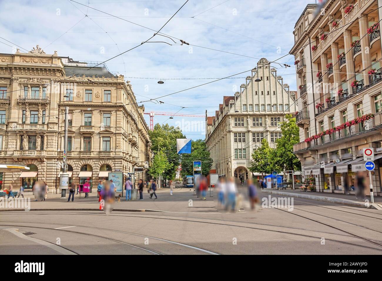 Square Paradeplatz , inner city of Zurich, view towards shopping promenade called Bahnhofstrasse. Stock Photo