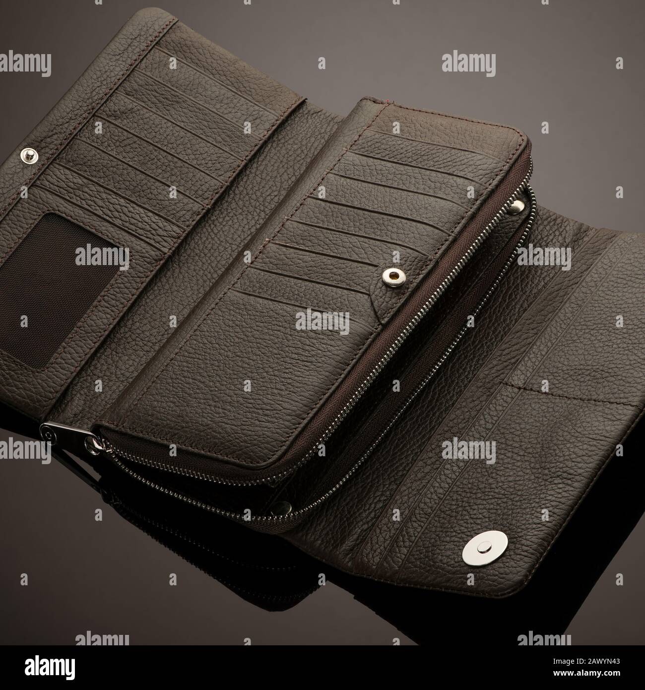 Fashionable leather men's wallet on a dark background Stock Photo