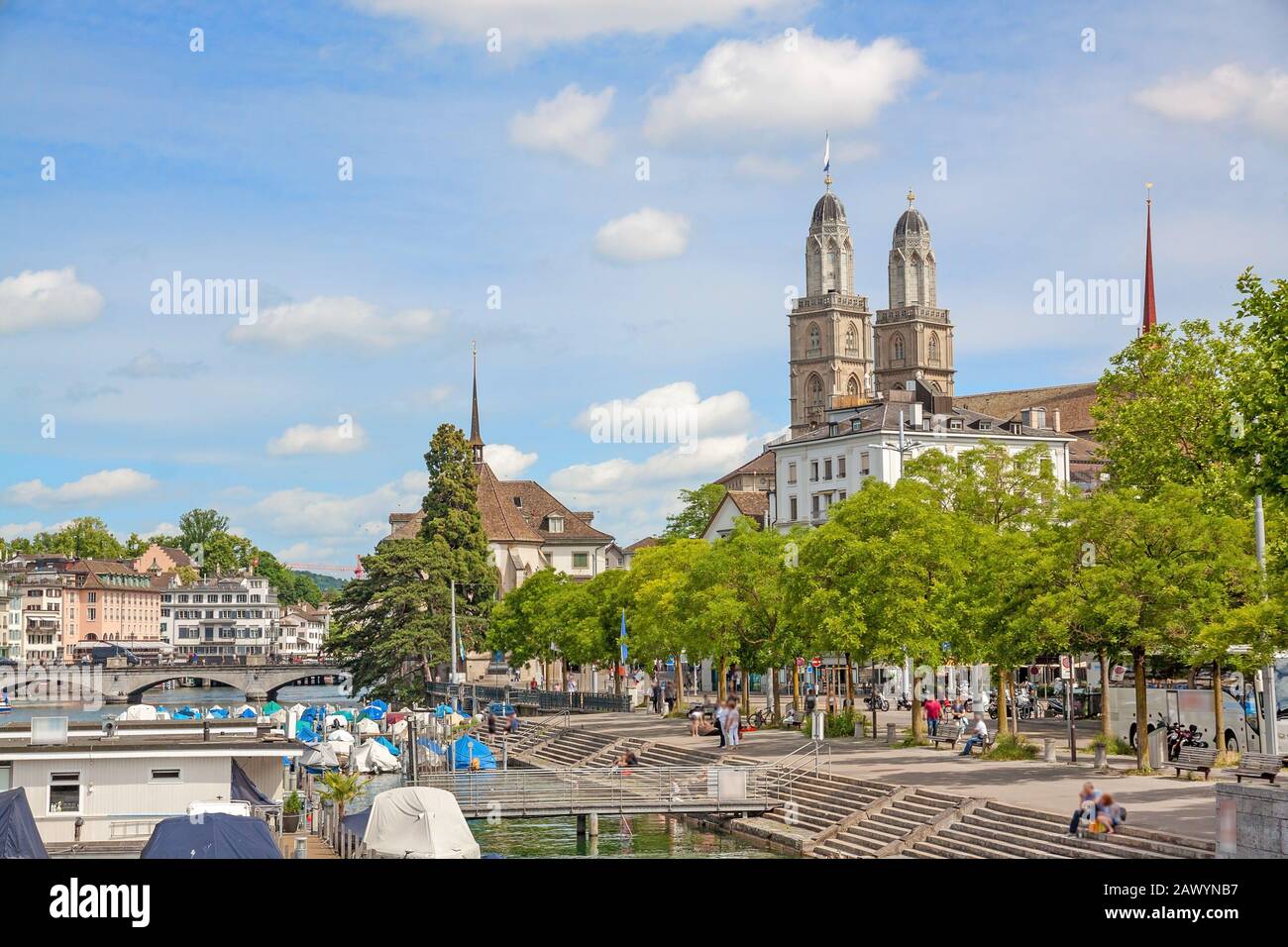 Minster Grossmunster, Zurich, Switzerland - view from Quaibrucke bridge, river Limmat in front. Stock Photo