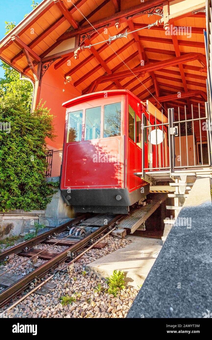 ropeway, summit station with red cable car parking Stock Photo